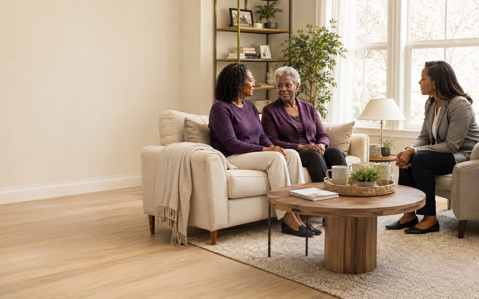 A family discussing an in-home support plan with a care professional
